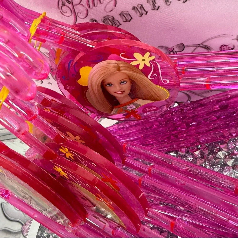 12 Barbie hangers 2001 Bright Pink acrylic Plastic Hangers with Character Accent